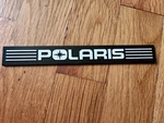 Polaris Snowmobile 5430979-133 Black/white Body Emblem Oem Nos New. Price: $24.95.