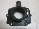 Polaris 1253146 Carburetor Adapter Mount 1997 & 1998 Xc 600 700 Rmk Sks Used. Price: $25.45.